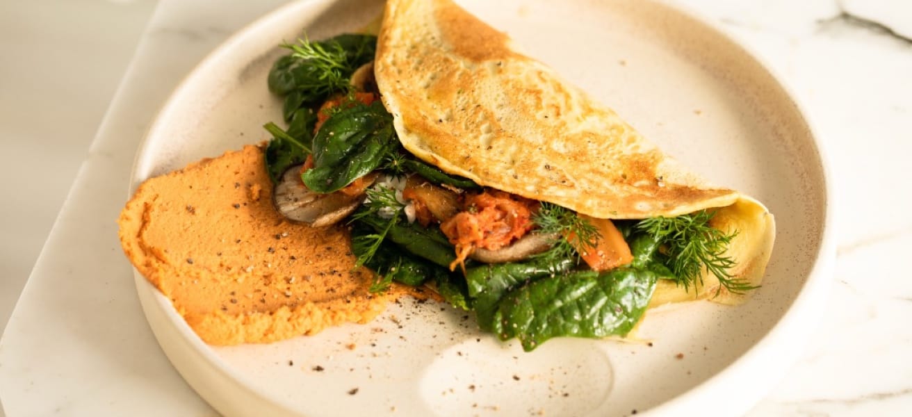 Yummy omelette on a plate with garnish